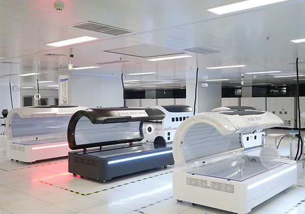 Multiple red light therapy beds under aging inspection